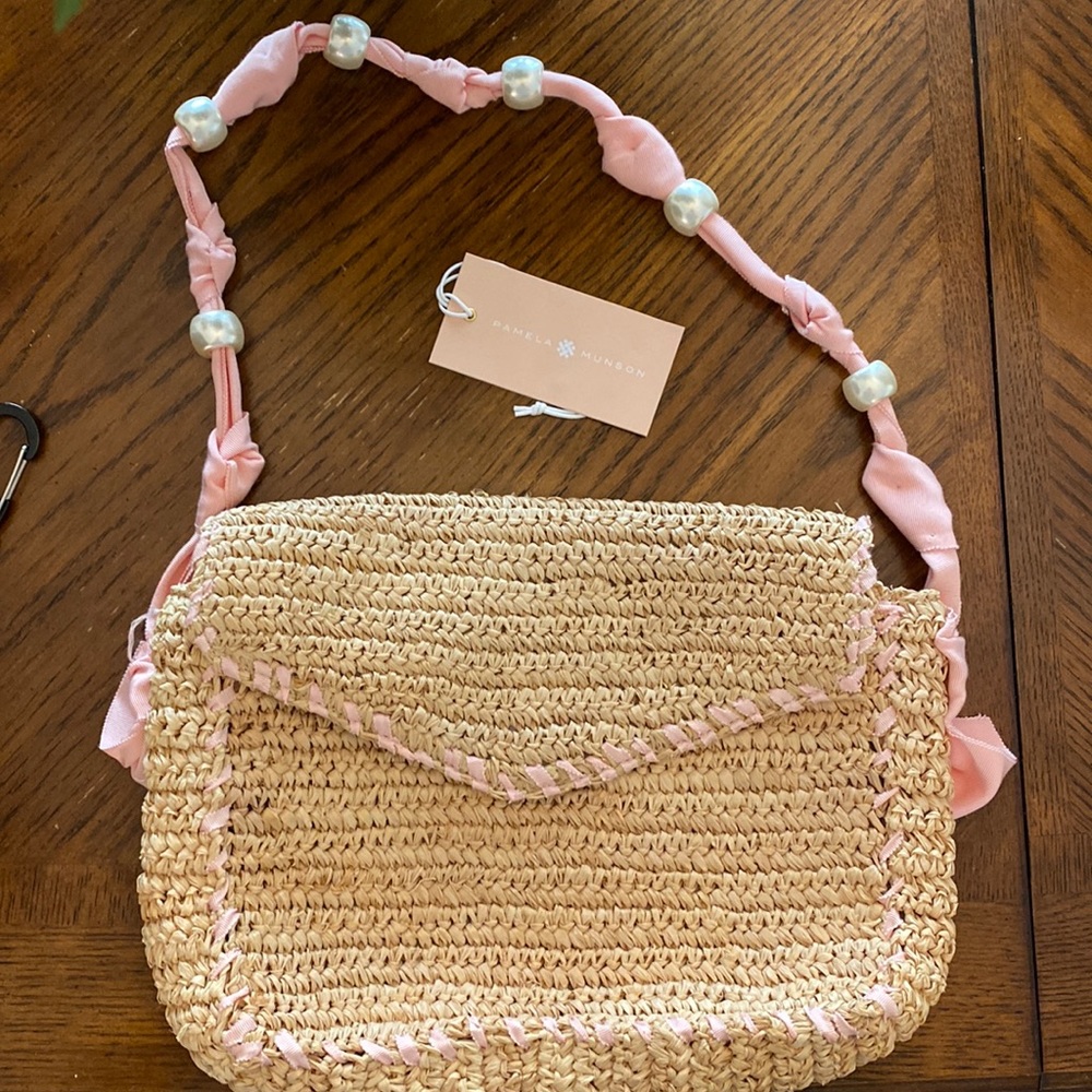 Pamela Munson pink tote with pearl strap